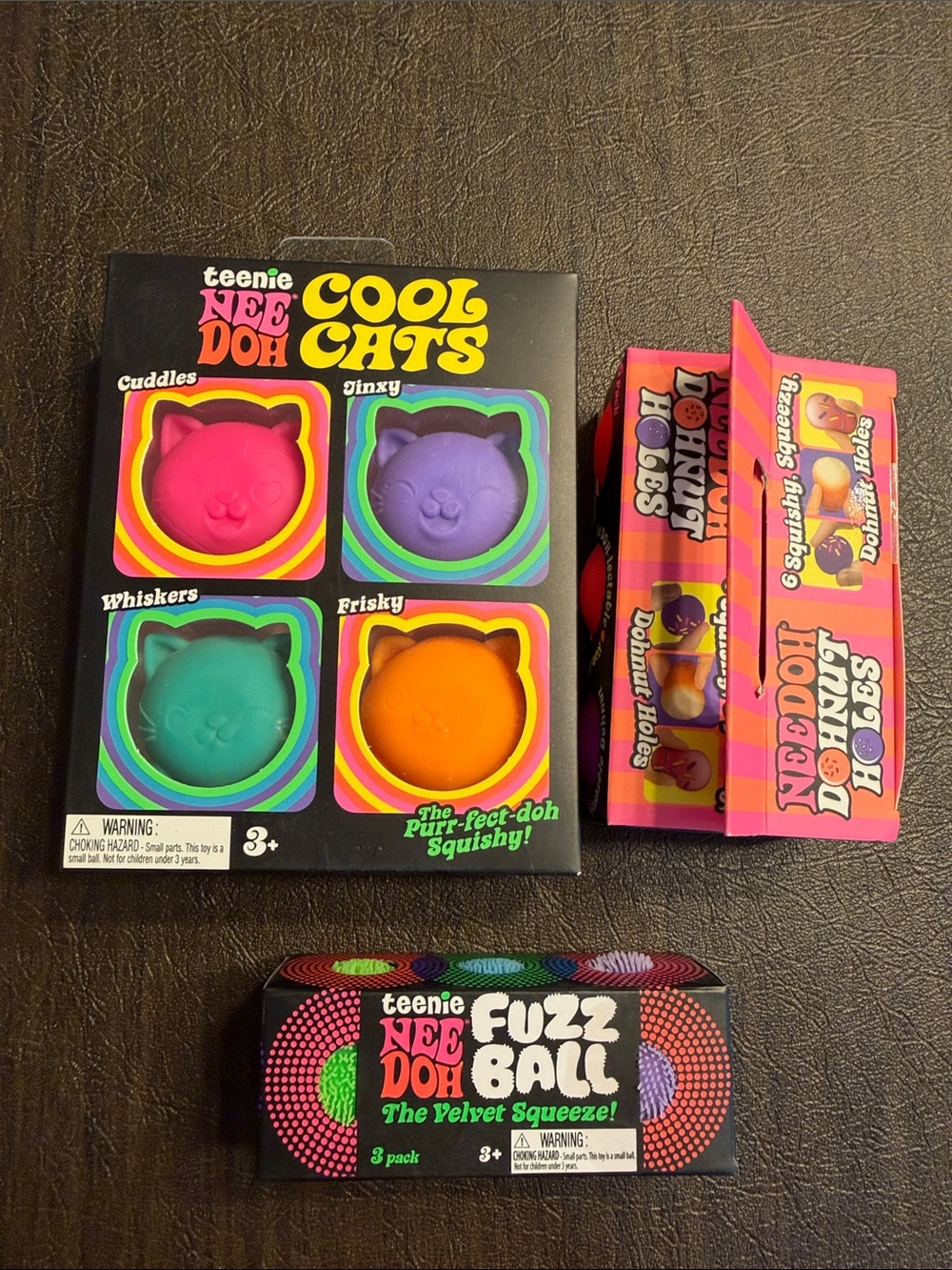 teenie NeeDoh Cool Cats 4-Pack Squishy Toys - Pink, Purple, Teal, Orange